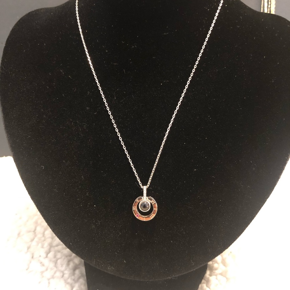 Silver Ring Pendant Necklace with Black Center